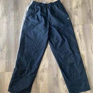 Nike Navy track pants with white stripe size large